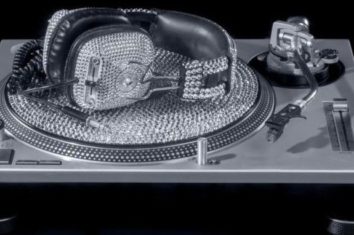 expensive crystal dj headphones and turntable