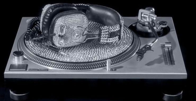 expensive crystal dj headphones and turntable