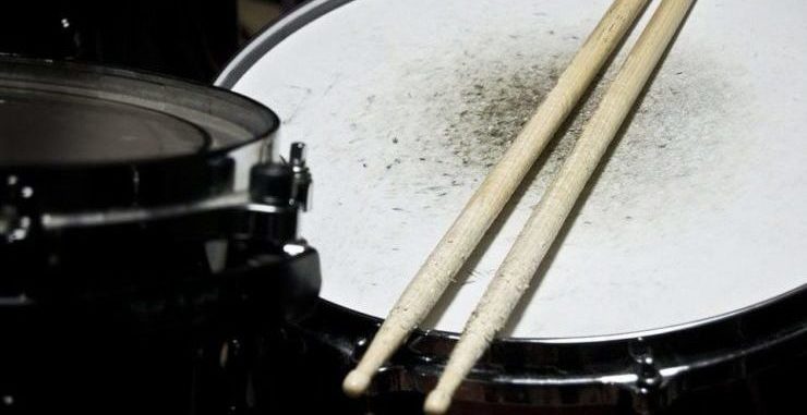 snare drums with drumsticks