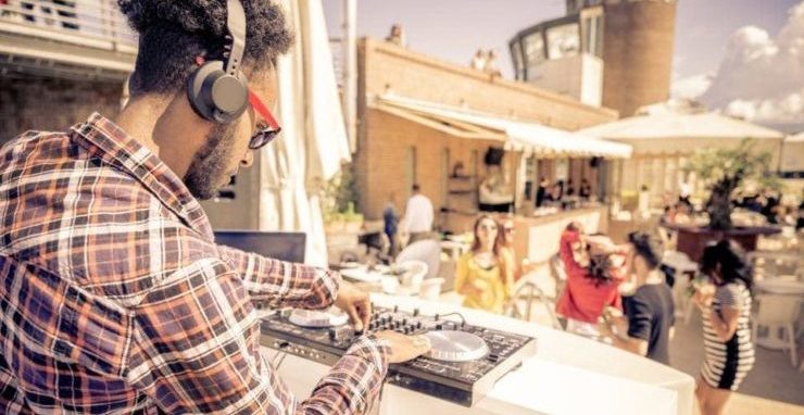 DJ playing music outside at a party